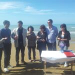 La commissione in spiaggia