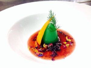 Gel di finocchietto selvatico servito su zappetta fredda di arance Ribera