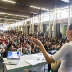 università