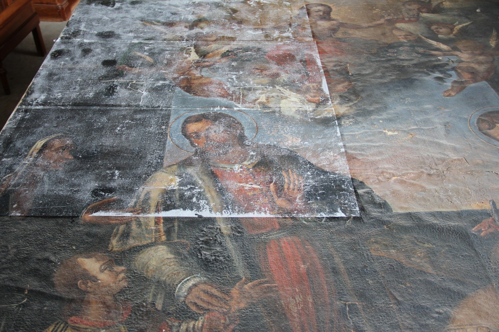 Si restaura la tela dei santi Cosma e Damiano