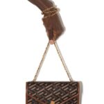 Clutch di Versace (Farfetch)