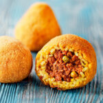 Modica, una arancina al ragù 3 euro