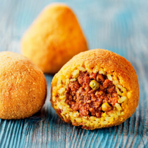 Modica, una arancina al ragù 3 euro